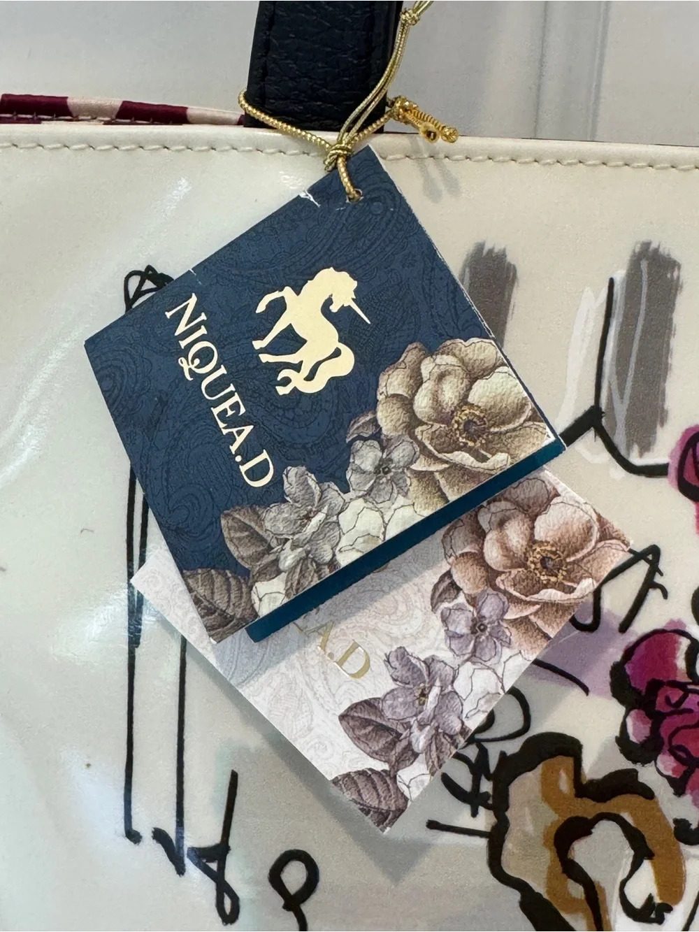 Nique White Patent Tote with Purple Illustration